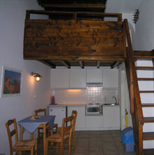kitchen and wooden loft
